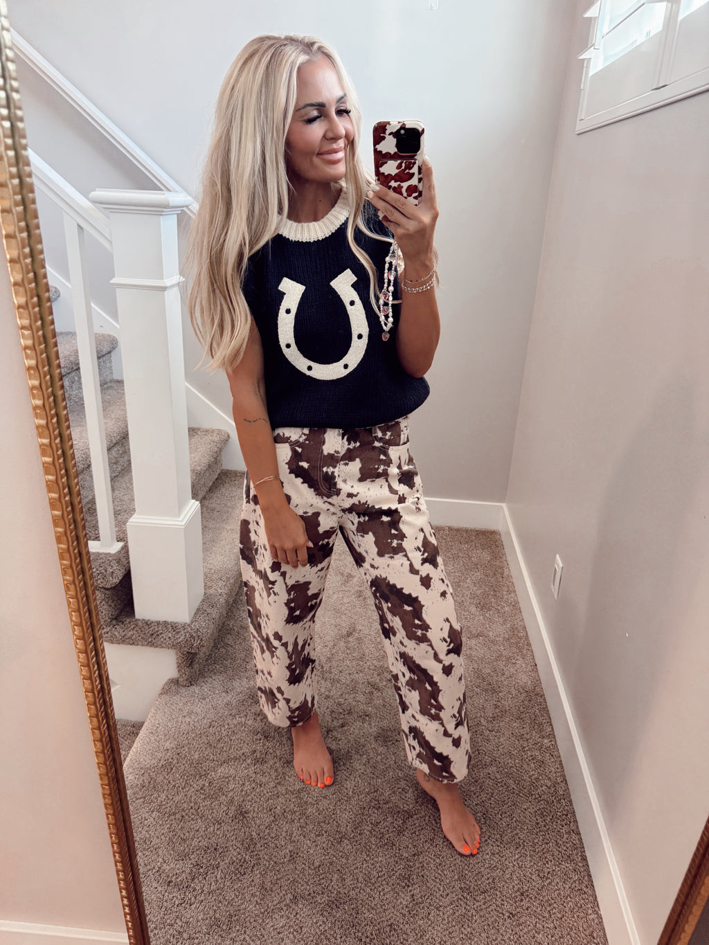 Horseshoe sweater vest
