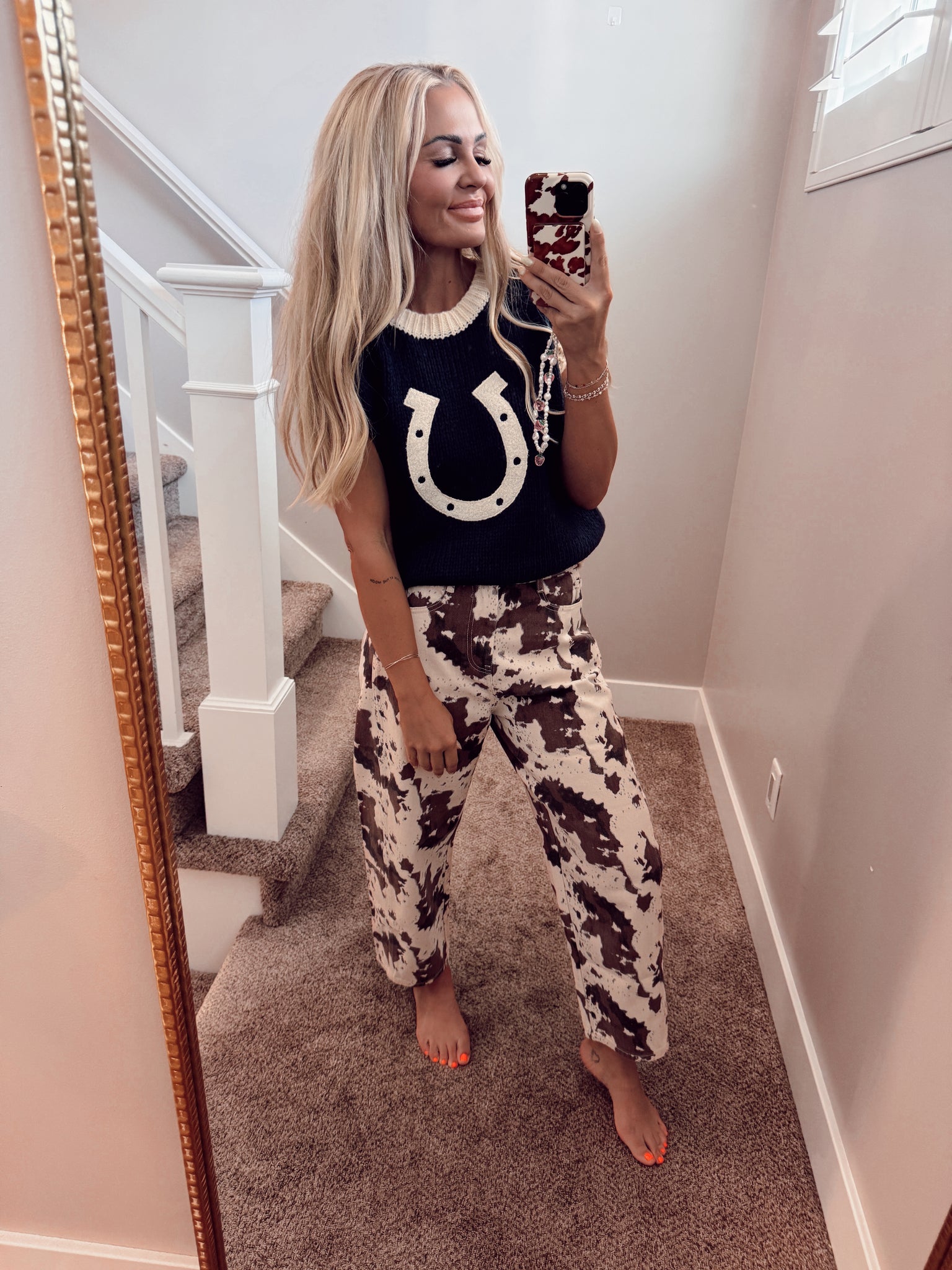 Horseshoe sweater vest